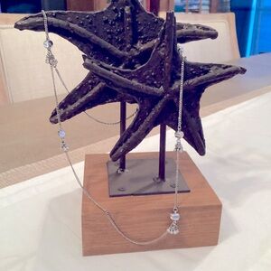 Simple design with bling necklace in silver tone